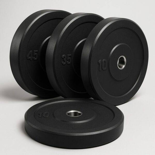Set of four black rubber bumper plates ranging from 10 to 45 pounds, featuring steel center inserts, displayed upright and flat on a light background with soft lighting.